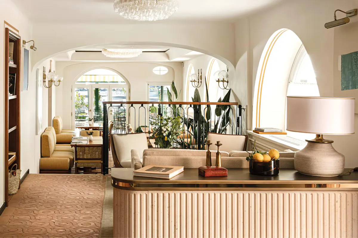 Hotel lobby interior with arched entry and seating