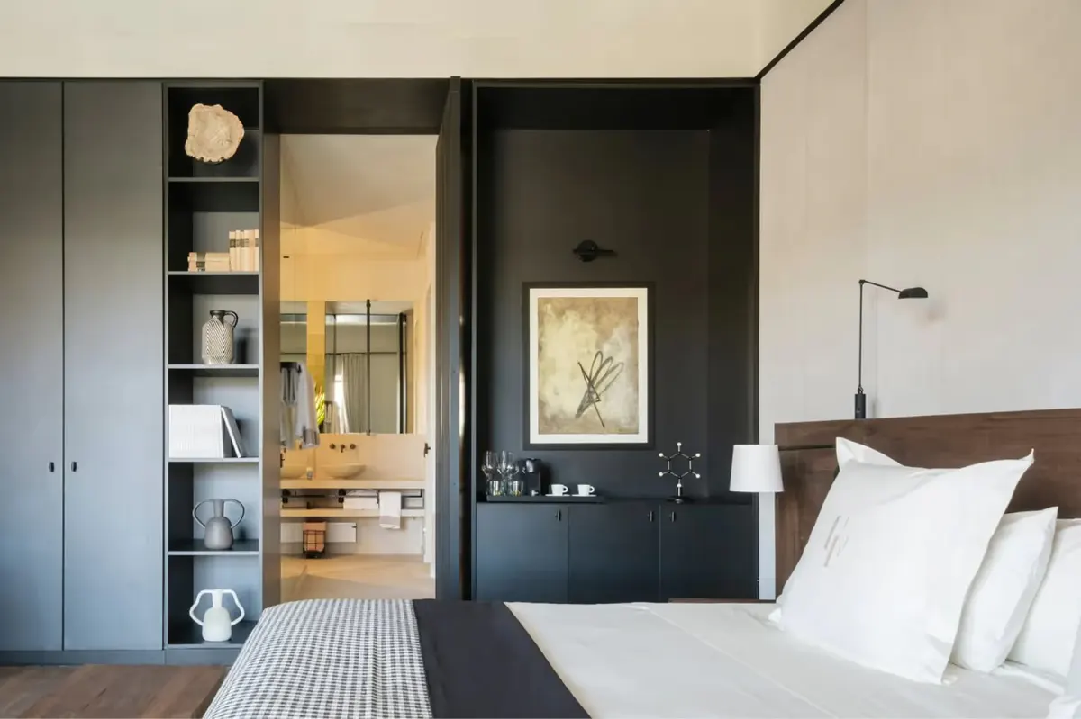 Guest room with simple furnishings and neutral color scheme