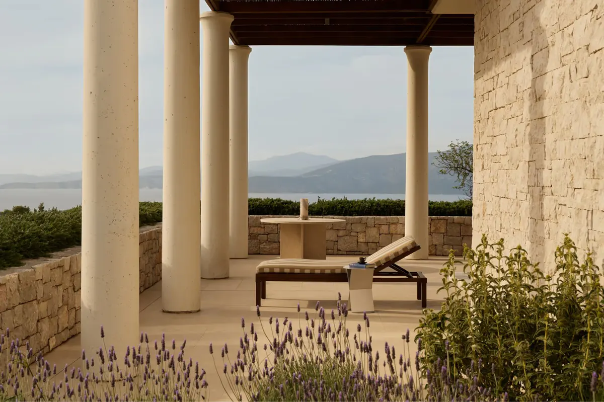 Columned terrace with mountain vistas and contemporary outdoor seating