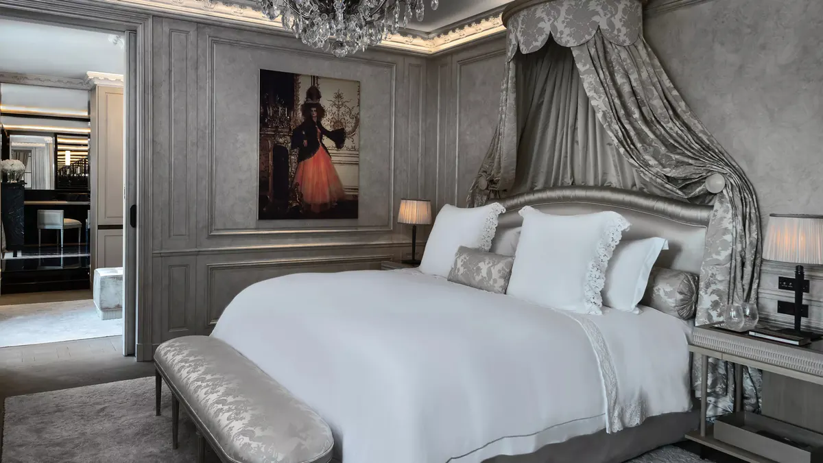 Grand suite with crystal chandelier, fireplace, and classical symmetrical layout