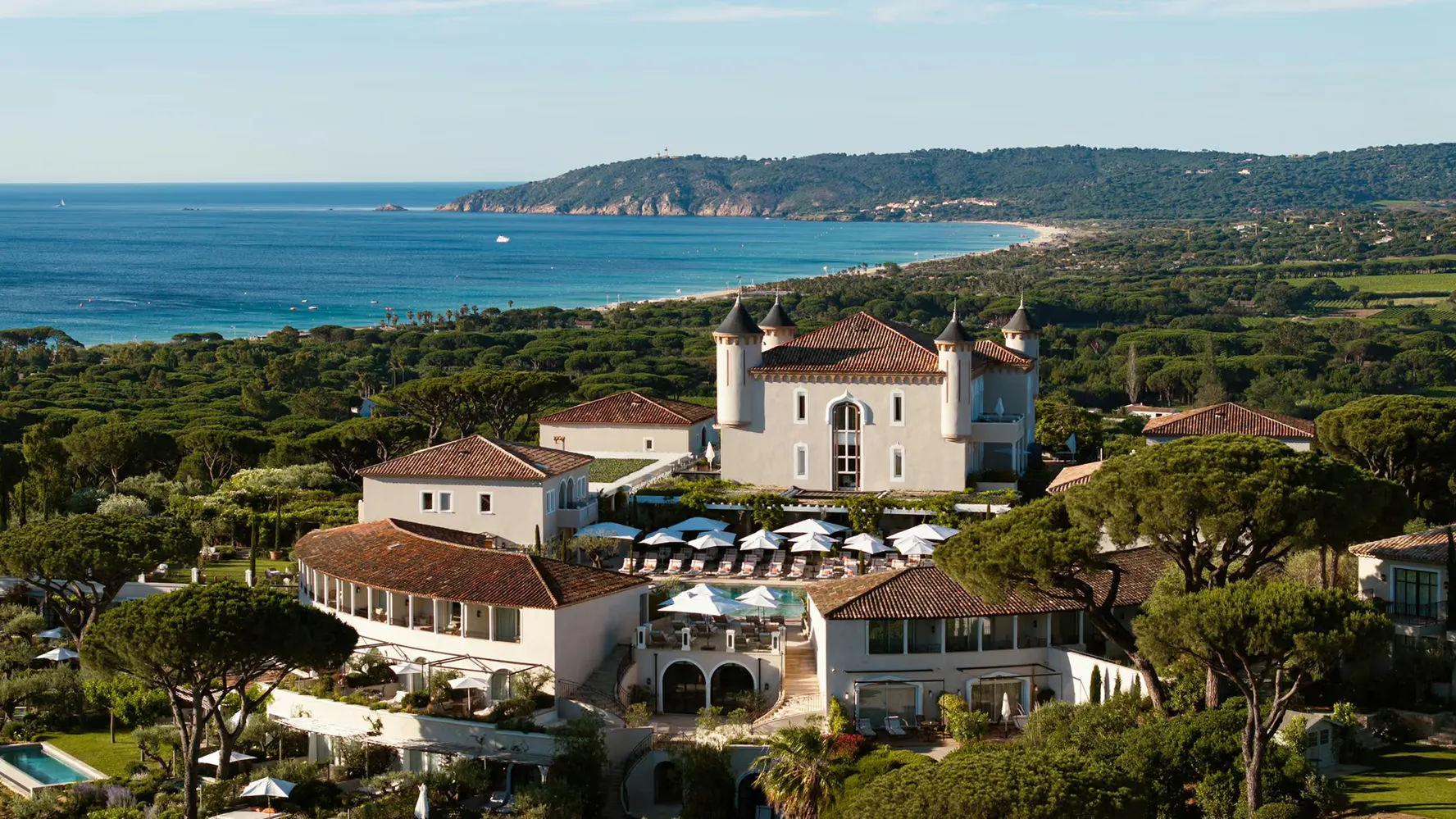 The turreted Château de la Messardière above the bay of Pampelonne