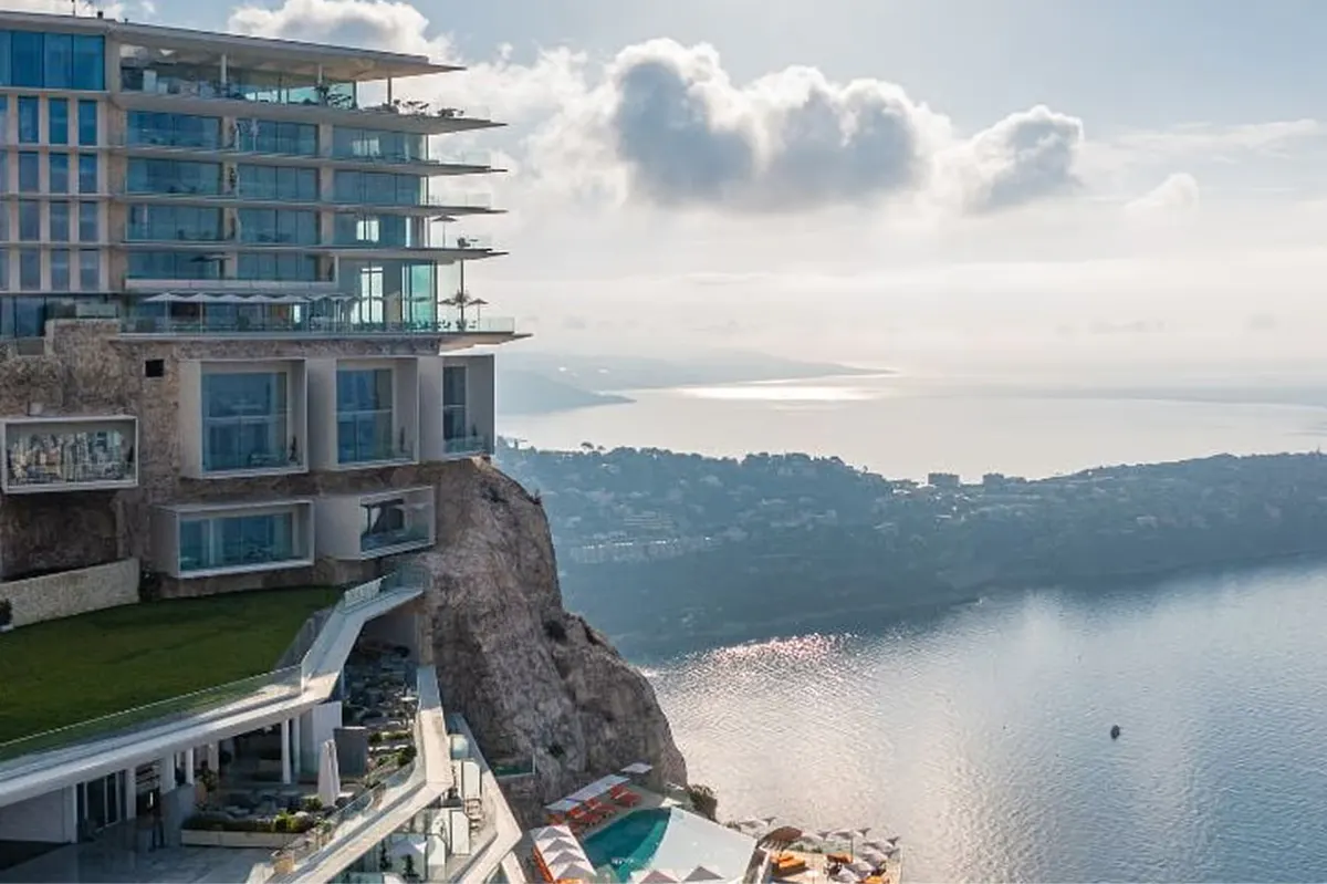 Modernist hotel on rocky coast with sea views