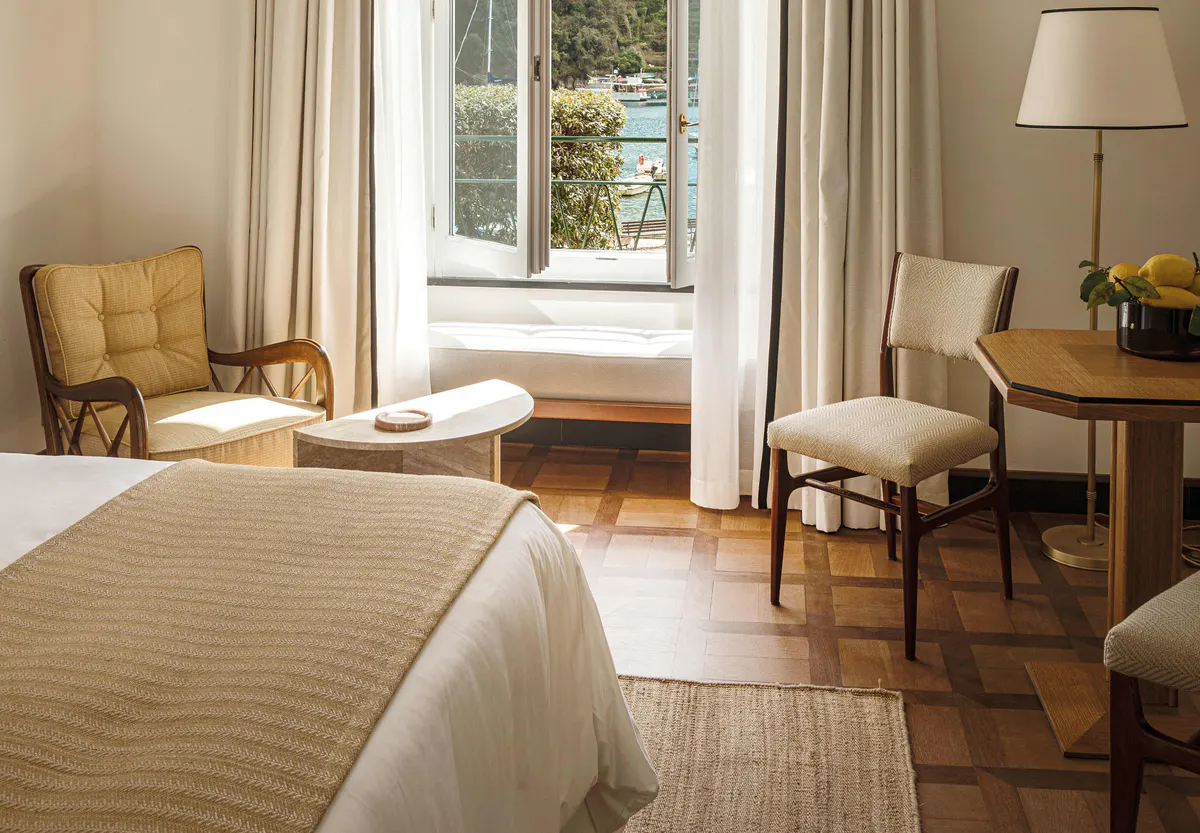 Bright bedroom with upholstered bench seating