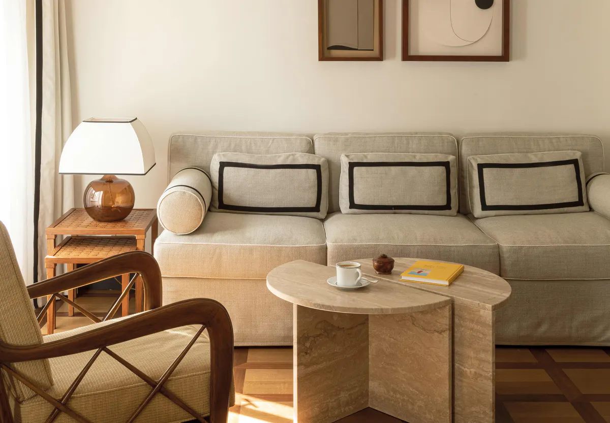 Sitting area with upholstered sofa and coffee table