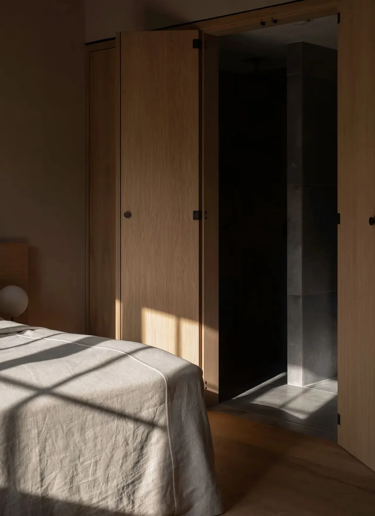 Morning light across a serene Copenhagen bedroom