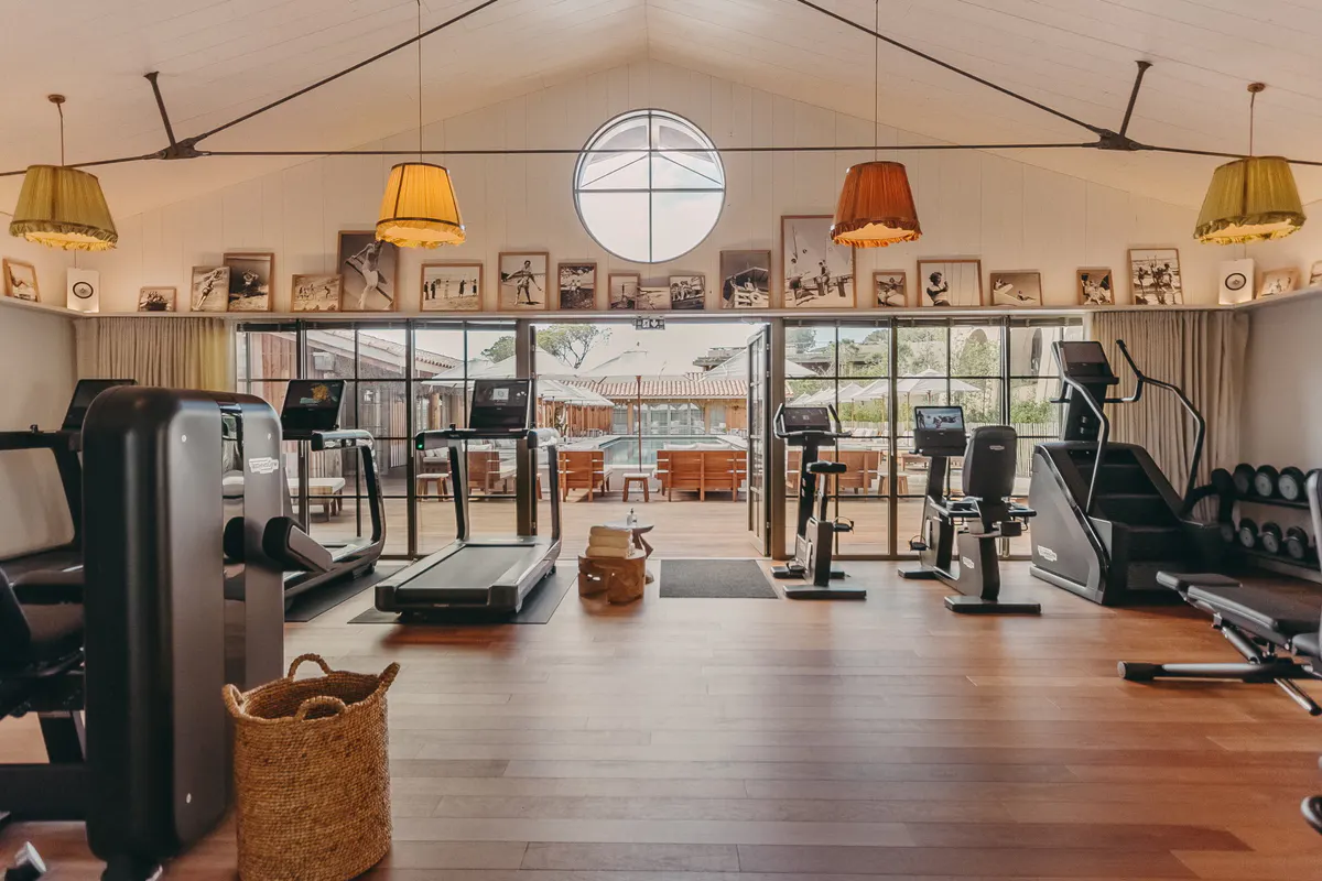 Fitness studio with equipment and views of Mediterranean beyond