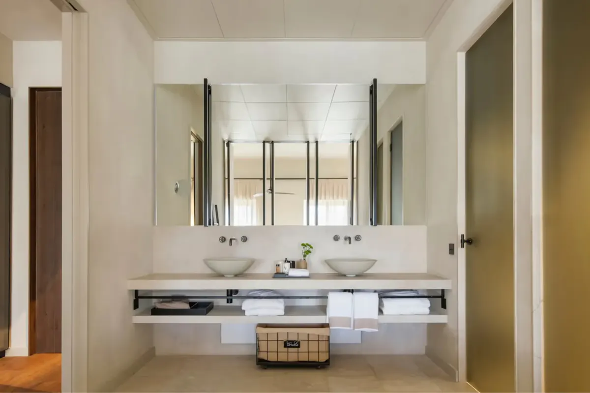 Spacious suite with seating area and exposed wooden architectural details