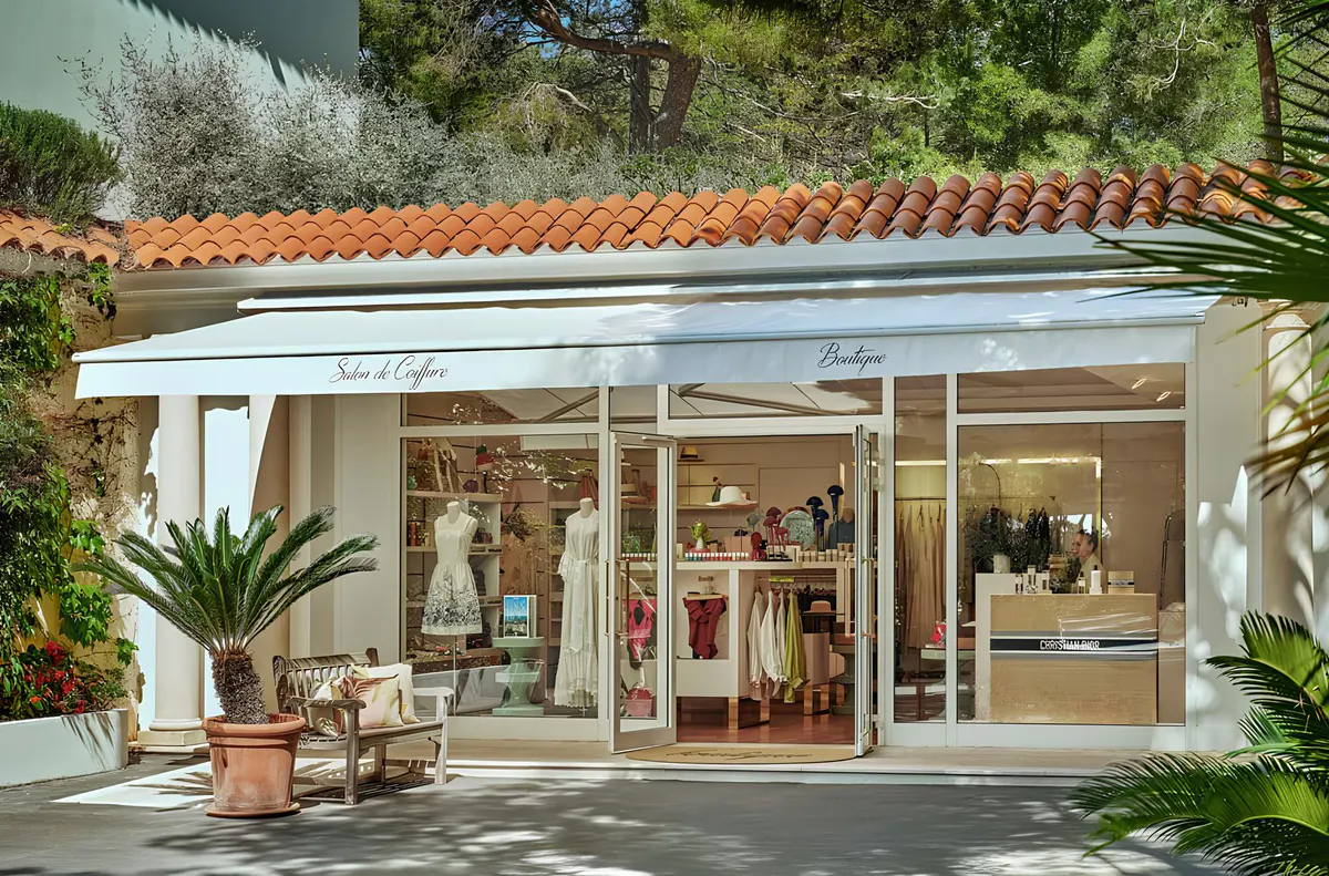 A boutique interior with shelving, retail displays, and soft cream interior finishes