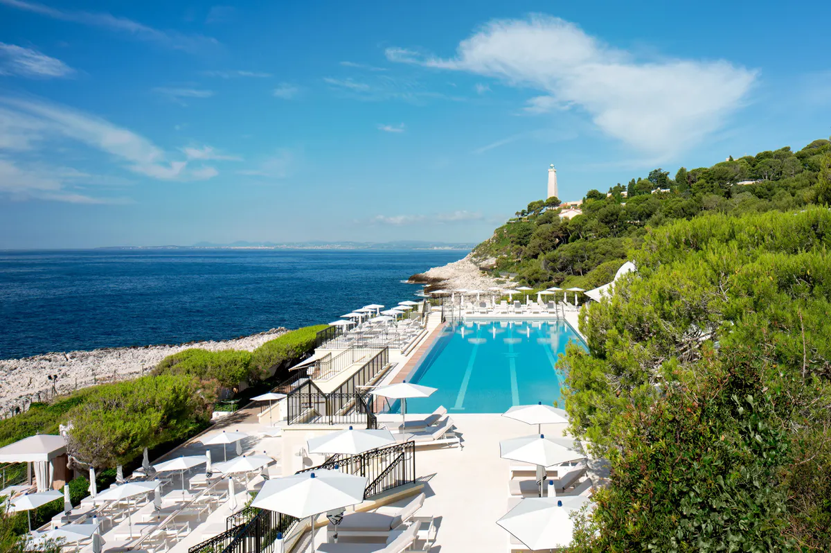 Clifftop pool and lounge deck overlooking the Mediterranean Sea