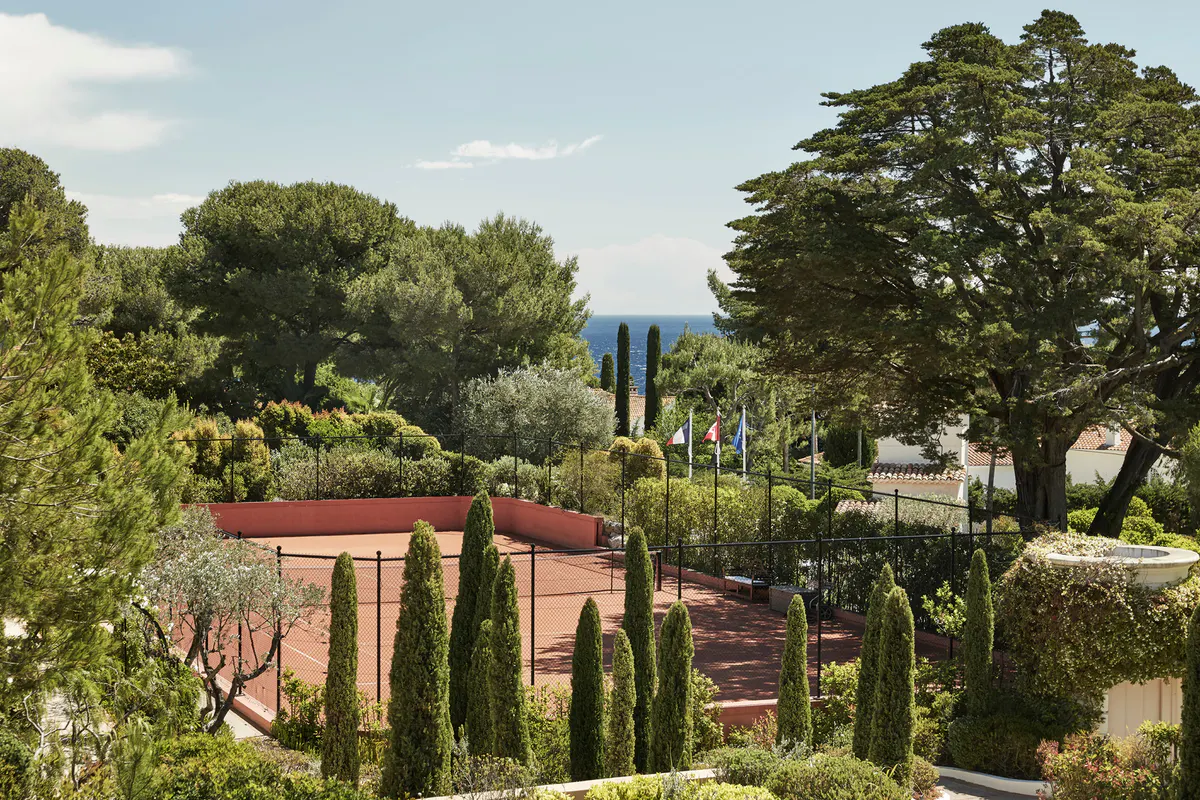 Peninsula gardens with cypress trees, view toward the sea