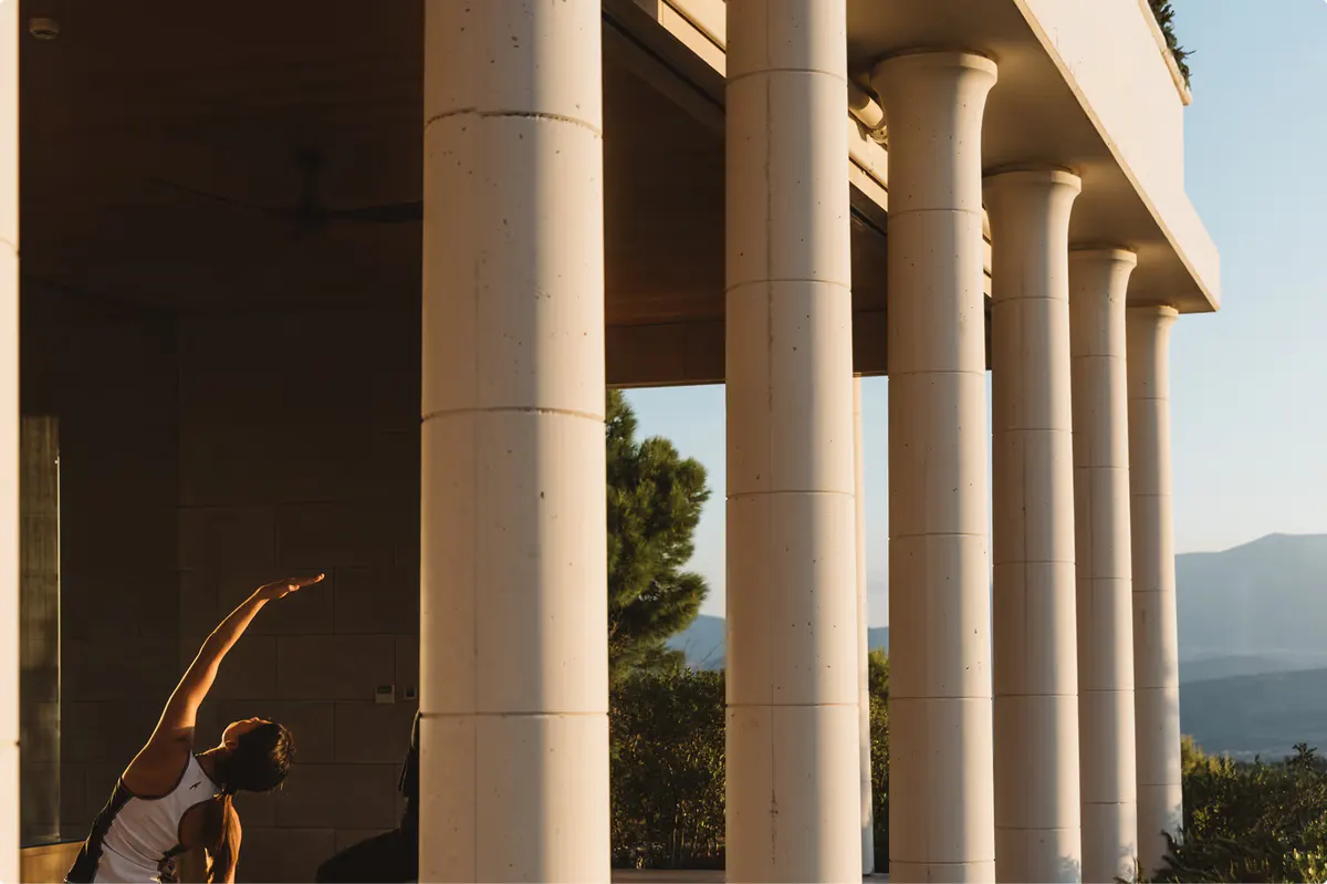Fitness facility with yoga mat and coastal landscape views