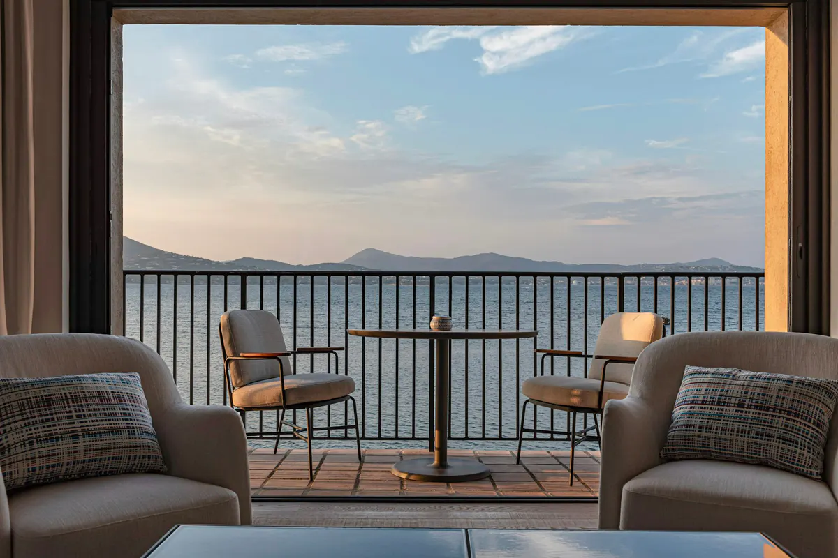 Terrace seating for two with expansive Mediterranean view