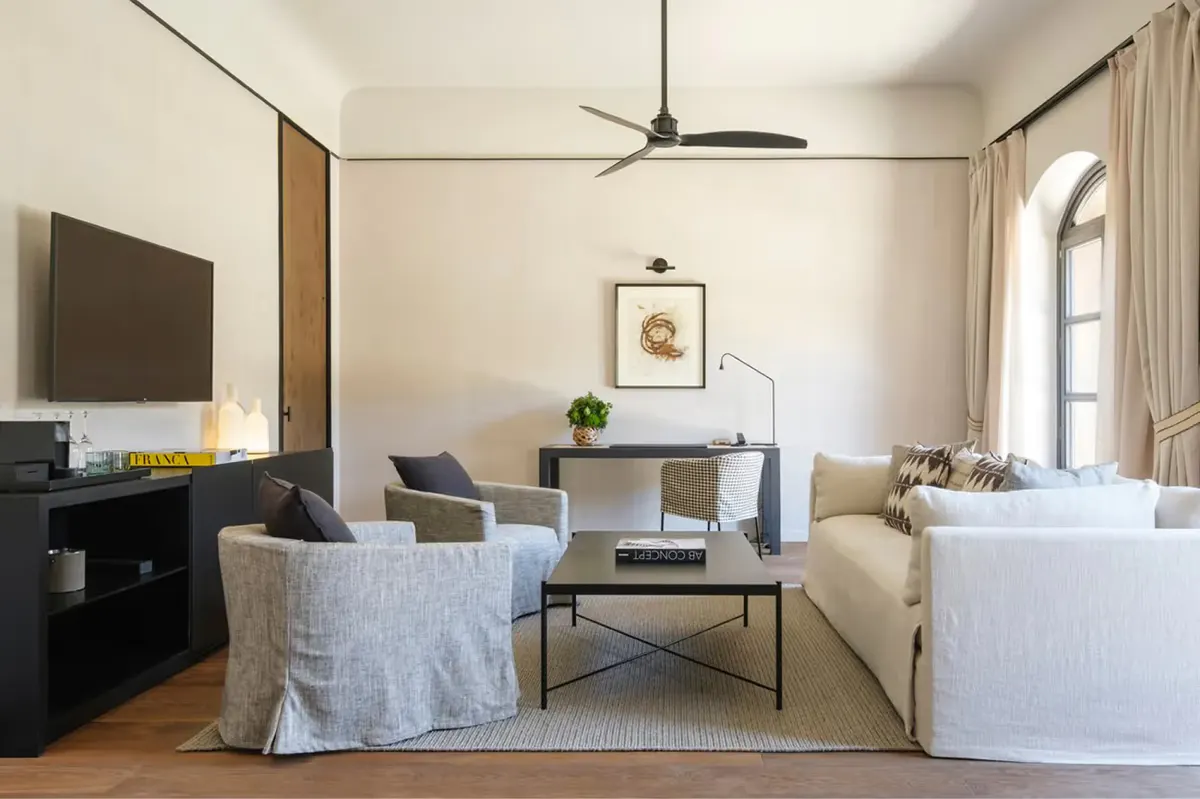 Suite with warm palette and designer furnishings