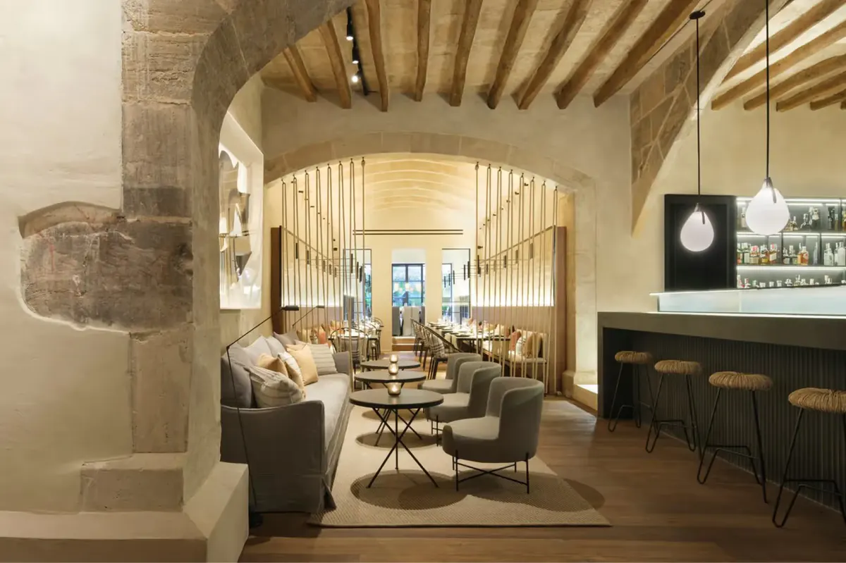 Restaurant interior with wooden barrel ceiling and sophisticated seating area
