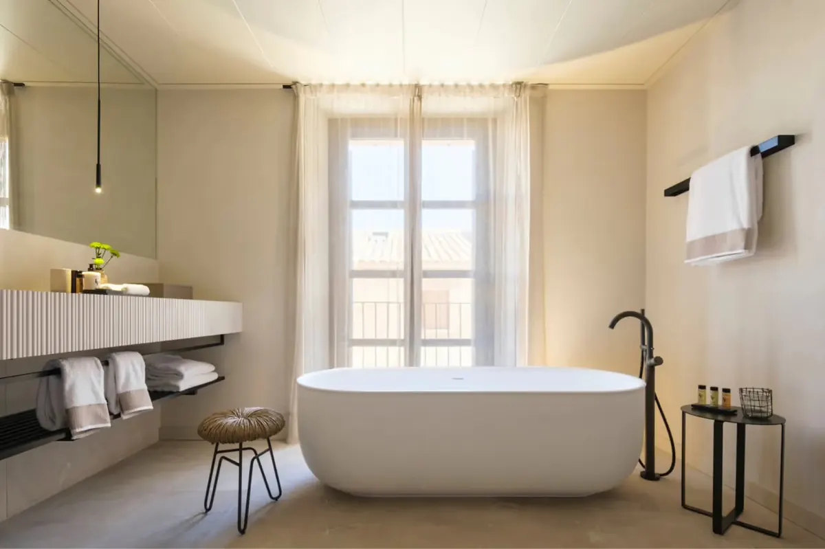 Guest room with modern comforts and neutral interior