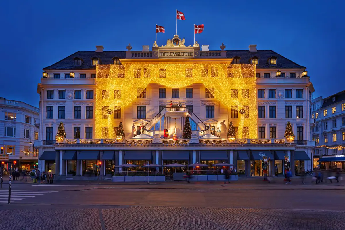 Historic building illuminated at night on town square in Copenhagen