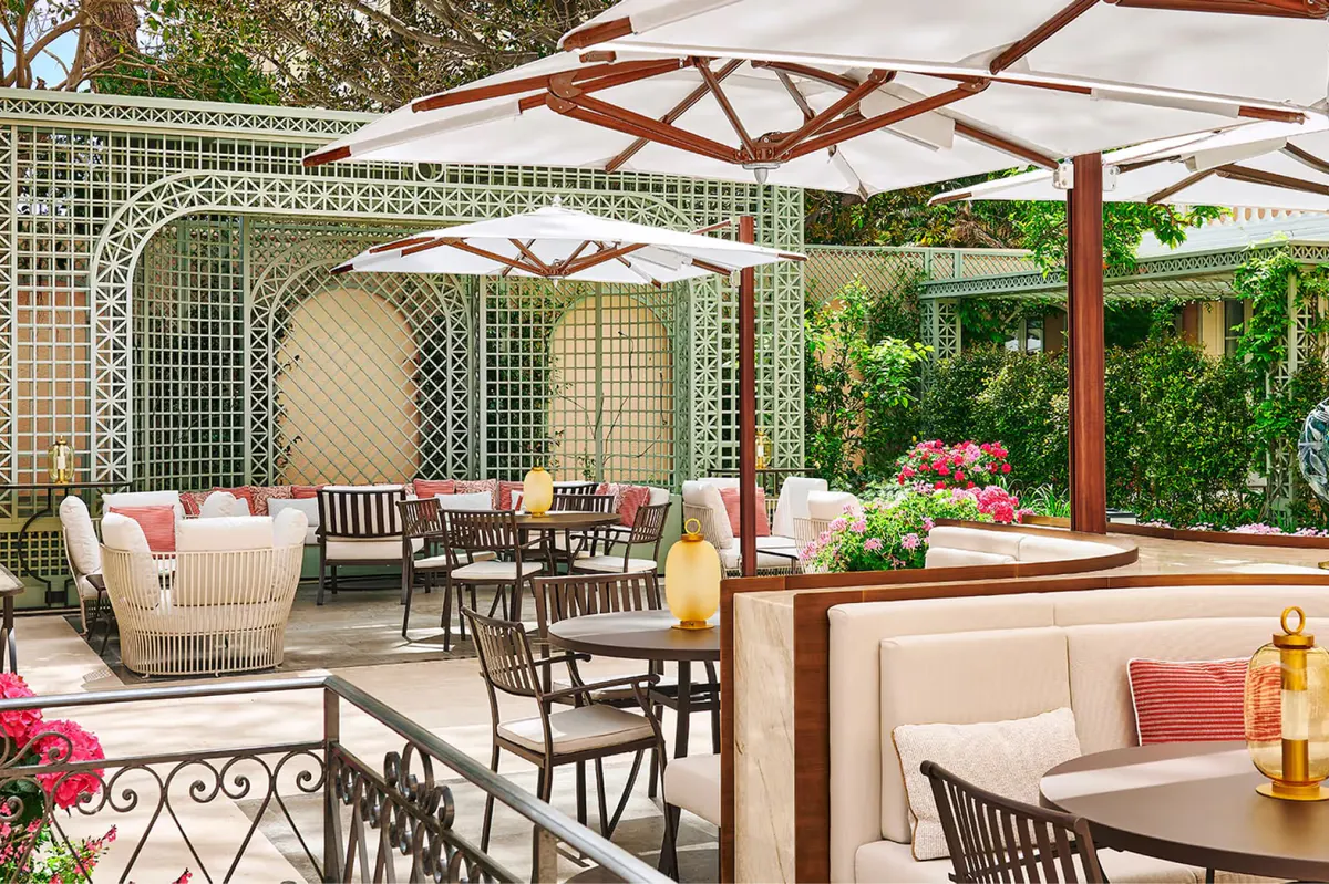 Outdoor garden terrace with seating and flowering plants