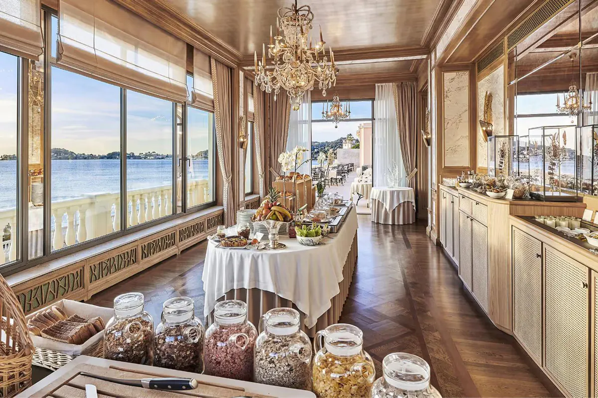 Fine dining room with picture windows overlooking the water and coastline