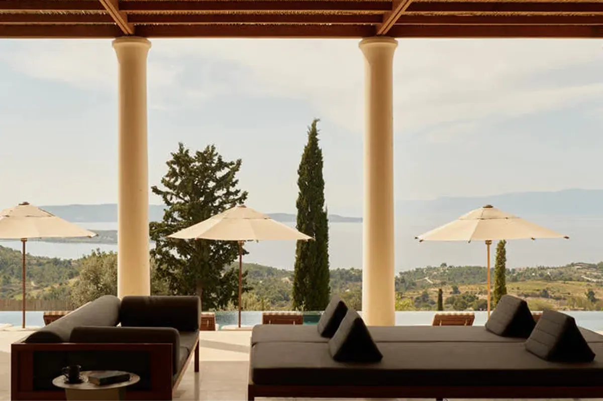 Sunset lounge terrace with stucco pergola and panoramic sea views