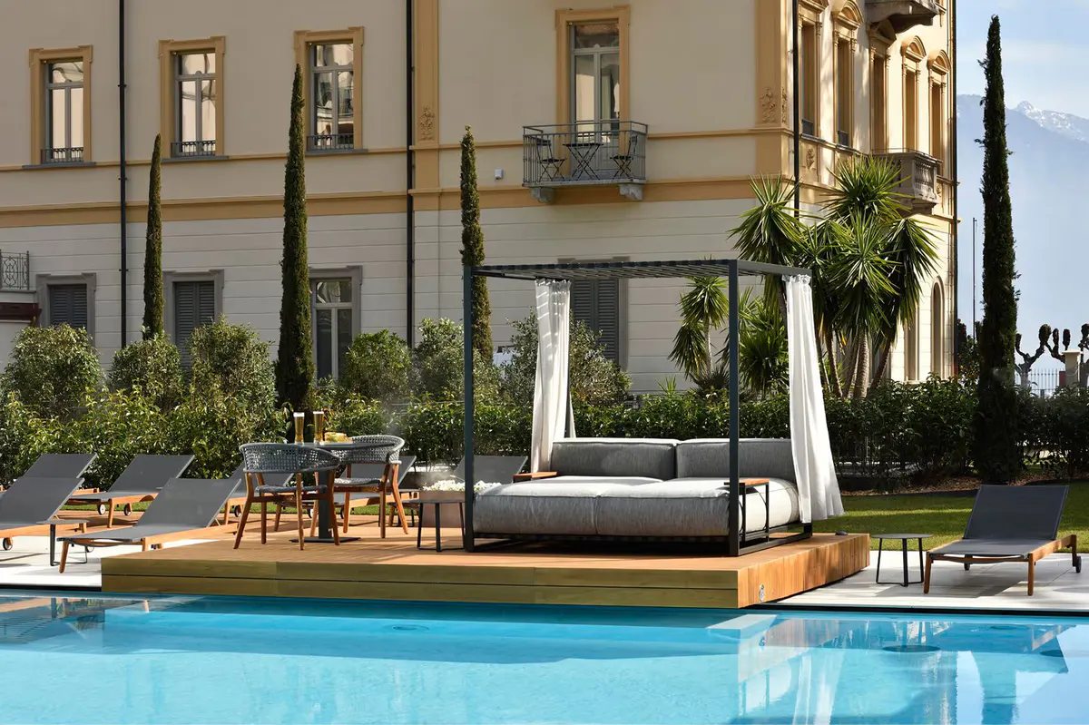 A spa and fitness center with exercise equipment and wood flooring