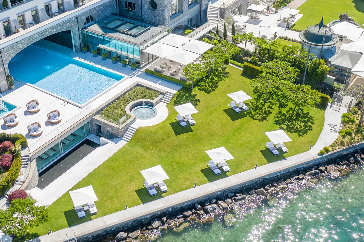Aerial view of hotel grounds with swimming pool and manicured lawns