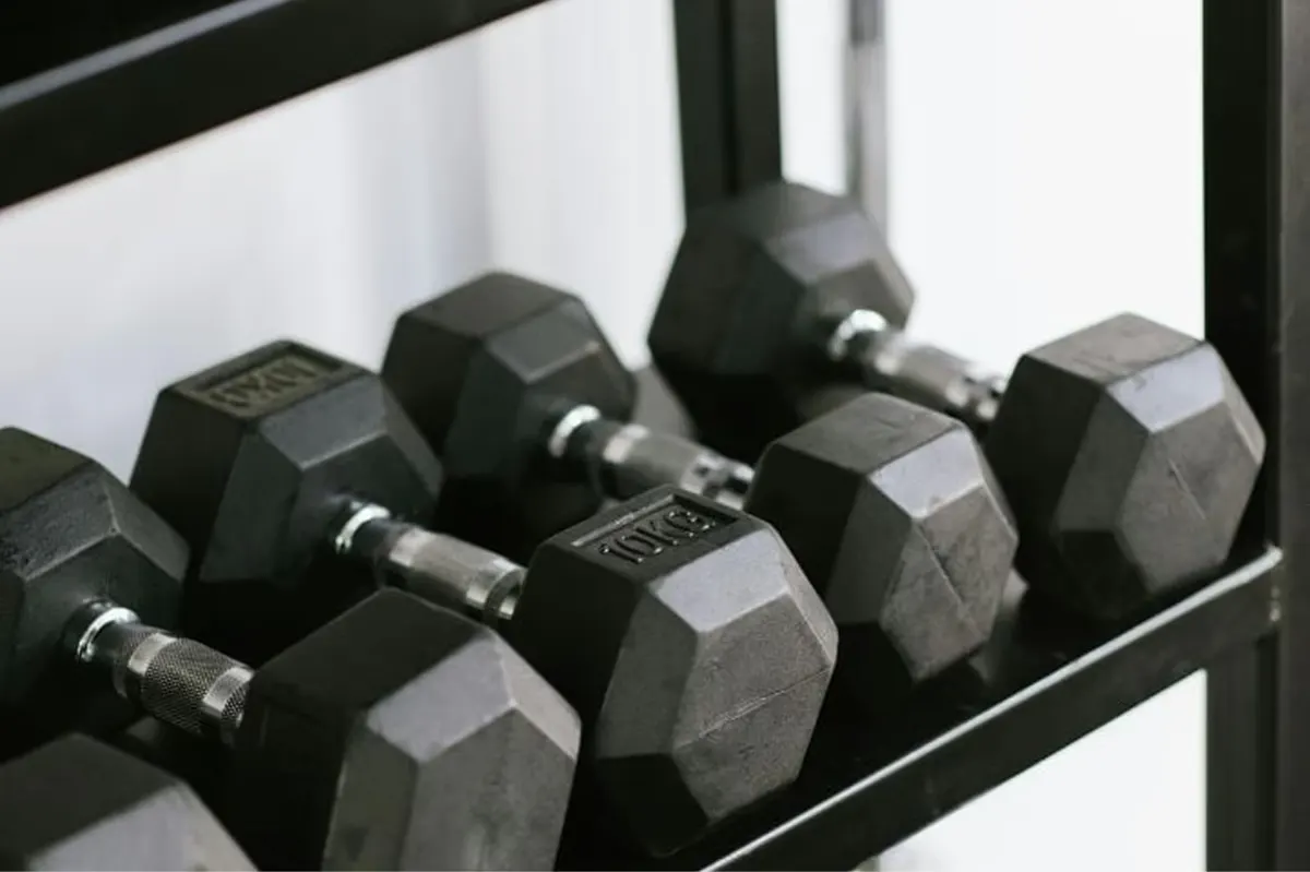 Fitness center with free weights on rack