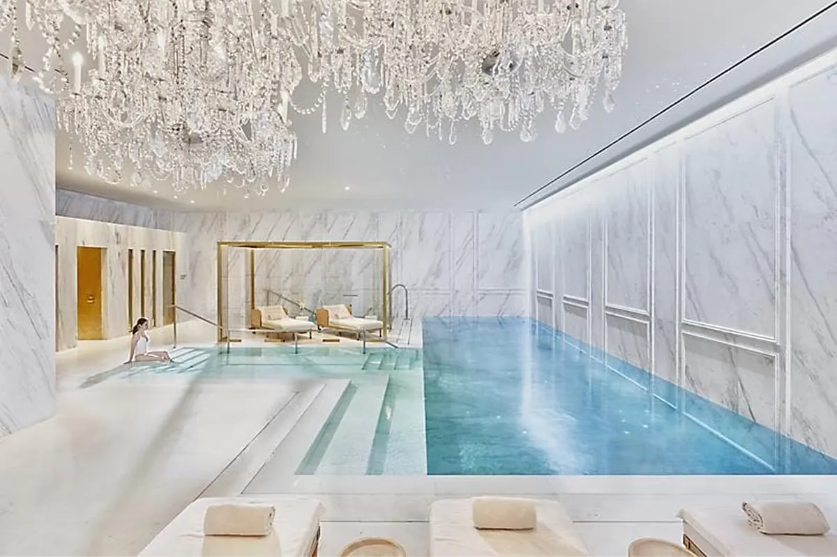 Indoor swimming pool with crystal chandelier and spa facilities