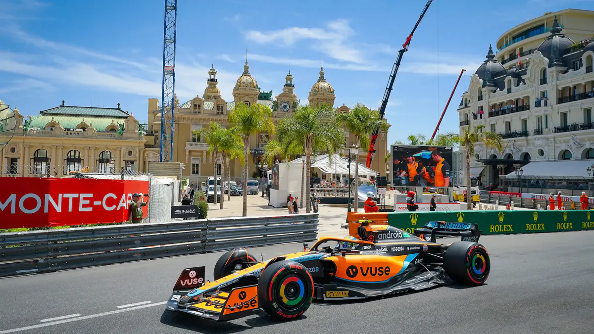 Formula 1 race car on Monaco street in front of historic palazzo