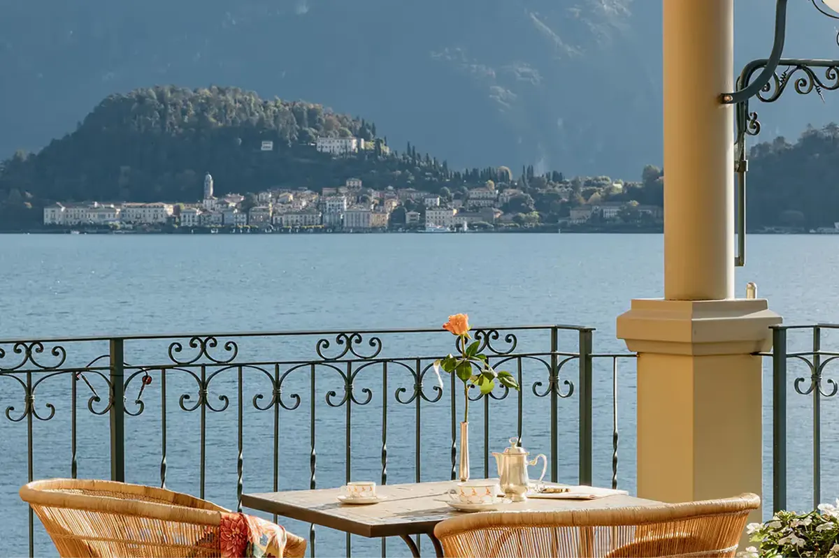 Lakeside table setting with mountains across the water