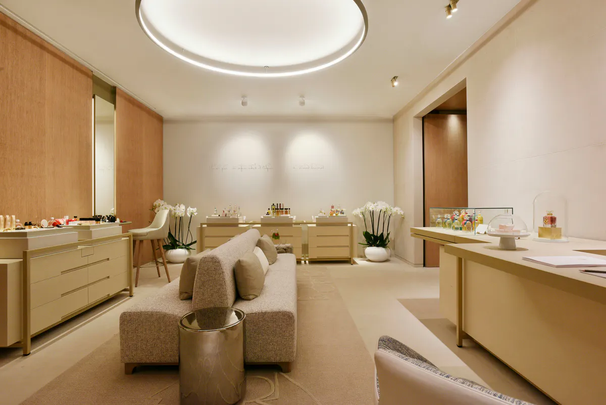 Spa treatment room with sunken seating and cream finishes